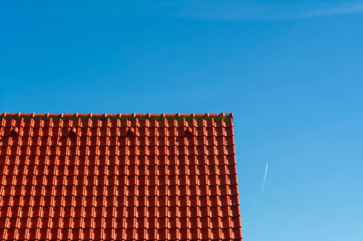 Tile roof gable in full sun, the kind of exposure that sets roof life in Norwalk, CT